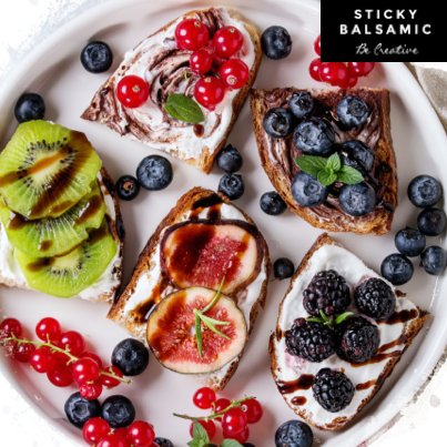 Sticky Balsamic Snacks with bread, fruit and balsamic drizzled over the top.