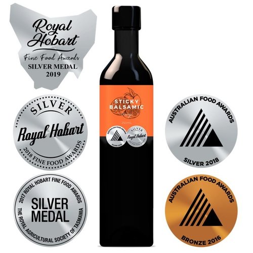 Sticky Balsamic Orange 250ml bottle surrounded by medals showing its quality
