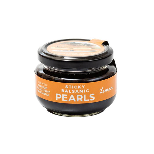 Sticky Balsamic Pearls - Lemon 110g net jar on a white baackground