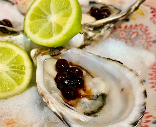 oysters and sticky balsamic pearls