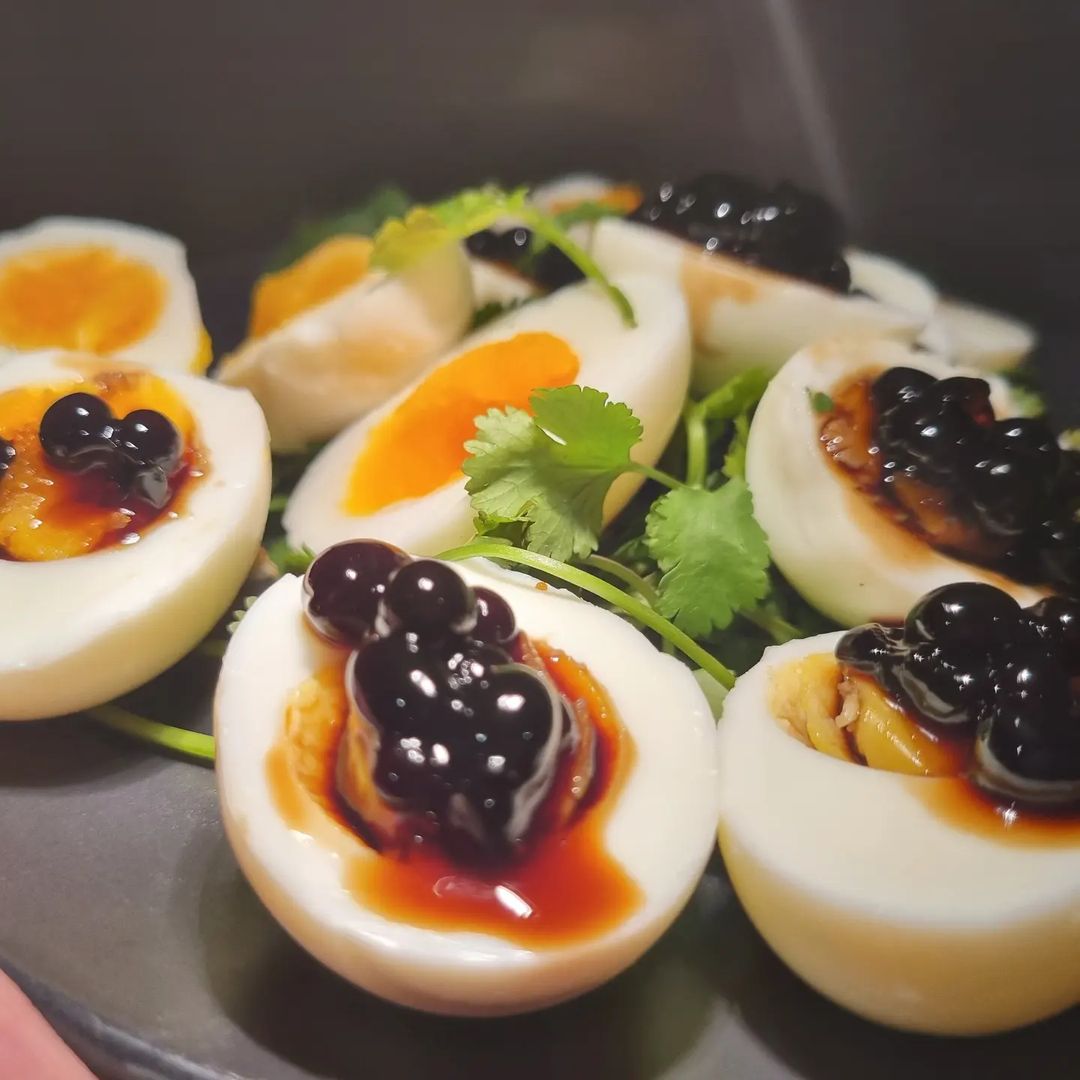 deviled eggs with sticky balsamic pearls