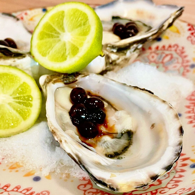 Oysters and Sticky Balsamic Pearls