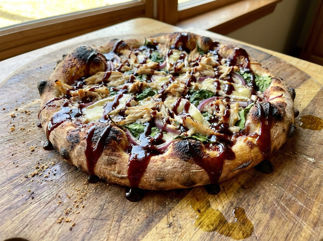 Pizza with chicken, brie, spinach, and lots of raspberry balsamic drizzle.