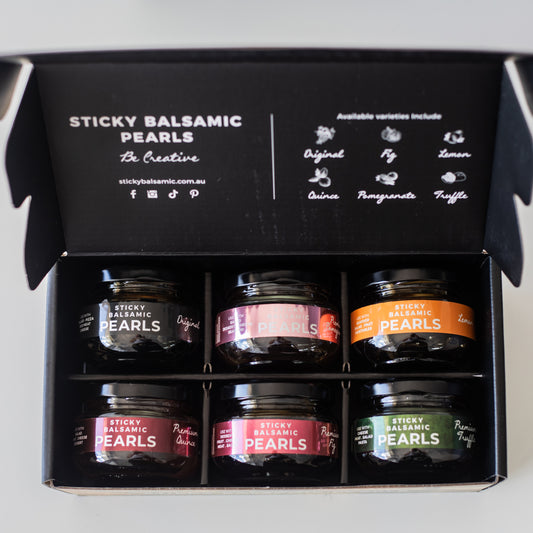 Sticky Balsamic Pearls Gift Box products packaged in a high quality black gift box on a white background