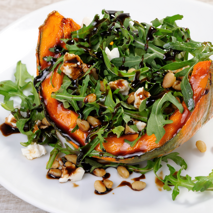 Sticky Balsamic roast pumpkin filled with salad glazed with Sticky Balsamic Garlic which is a limited edition product