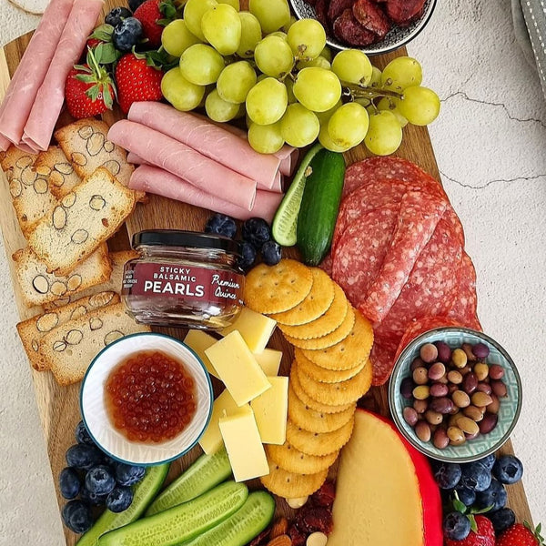 Sticky Balsamic QUince Pearls on a cheese and charcuterie platter