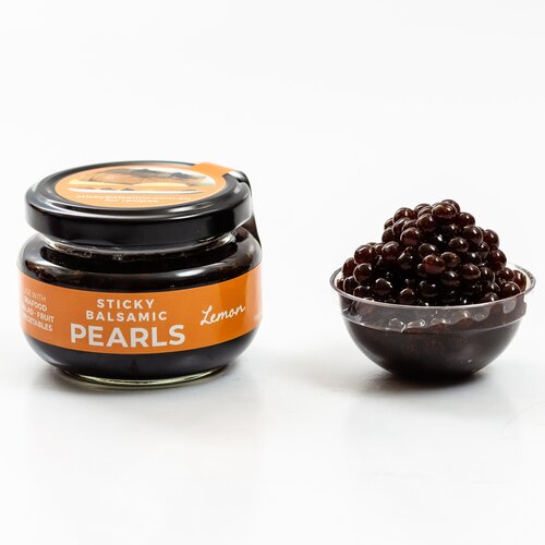 Sticky balsamic pearls jar and bowl of dark pearls