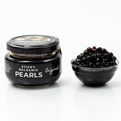 original Balsamic pearls jar with bowl of glossy dark pearls