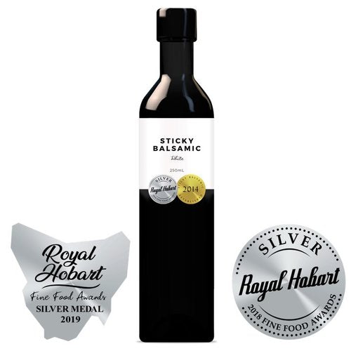 Sticky balsamic bottle with Royal Hobart silver fine food awards seals and black cap.